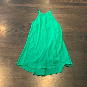 Green dress, flowing.